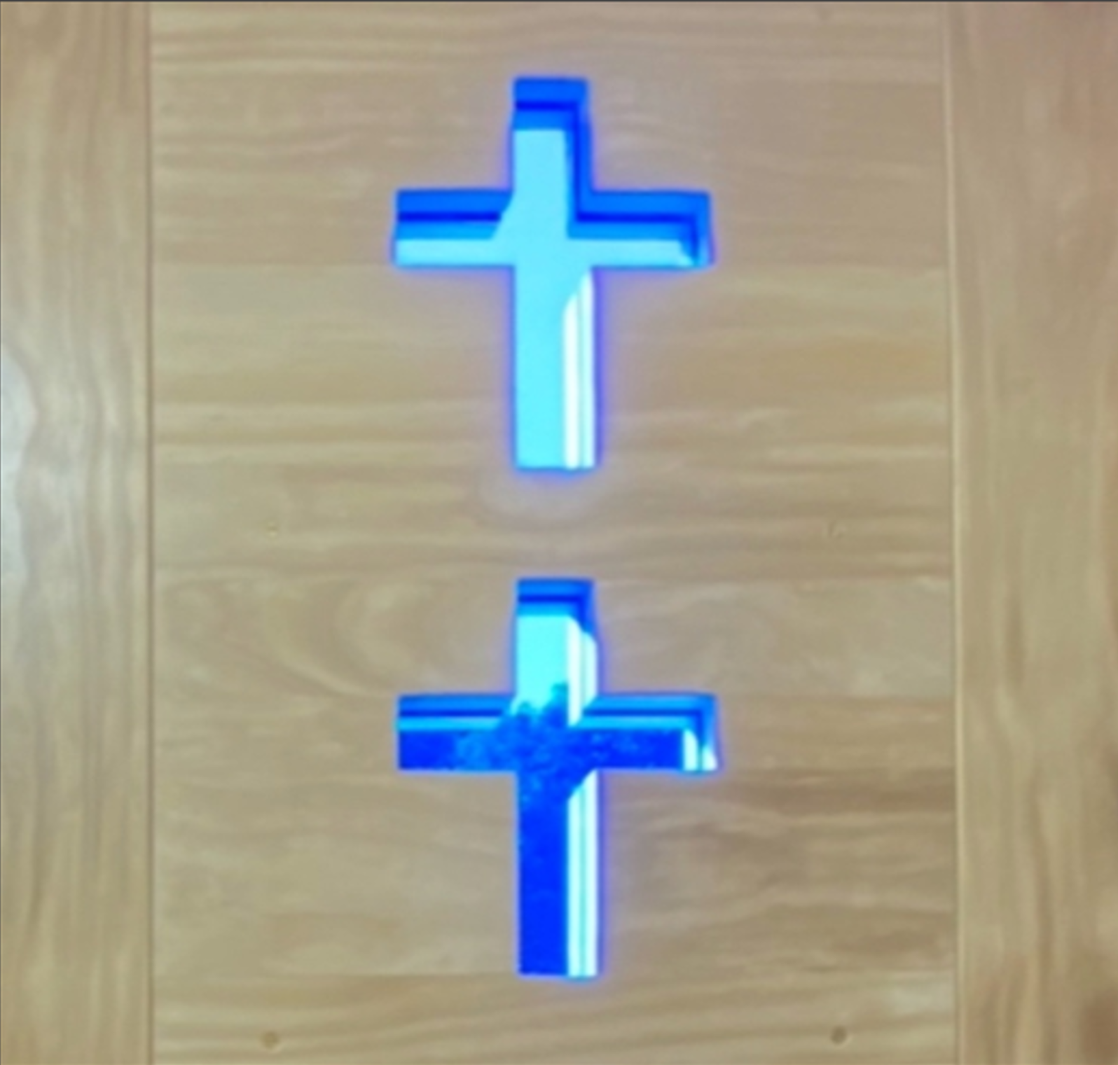 Church doors with blue stained glass crosses