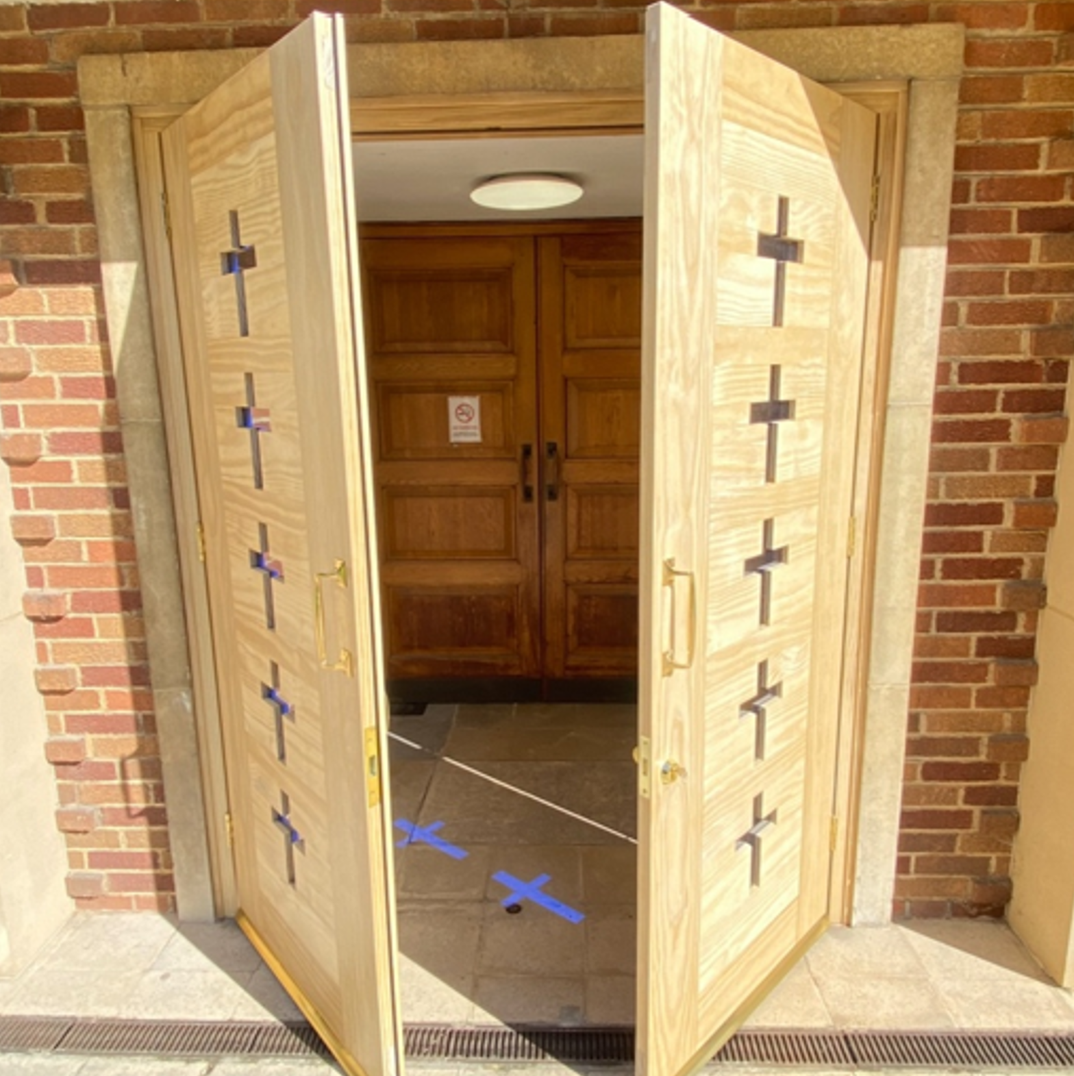 Full view of church entrance doors in Accoya timber