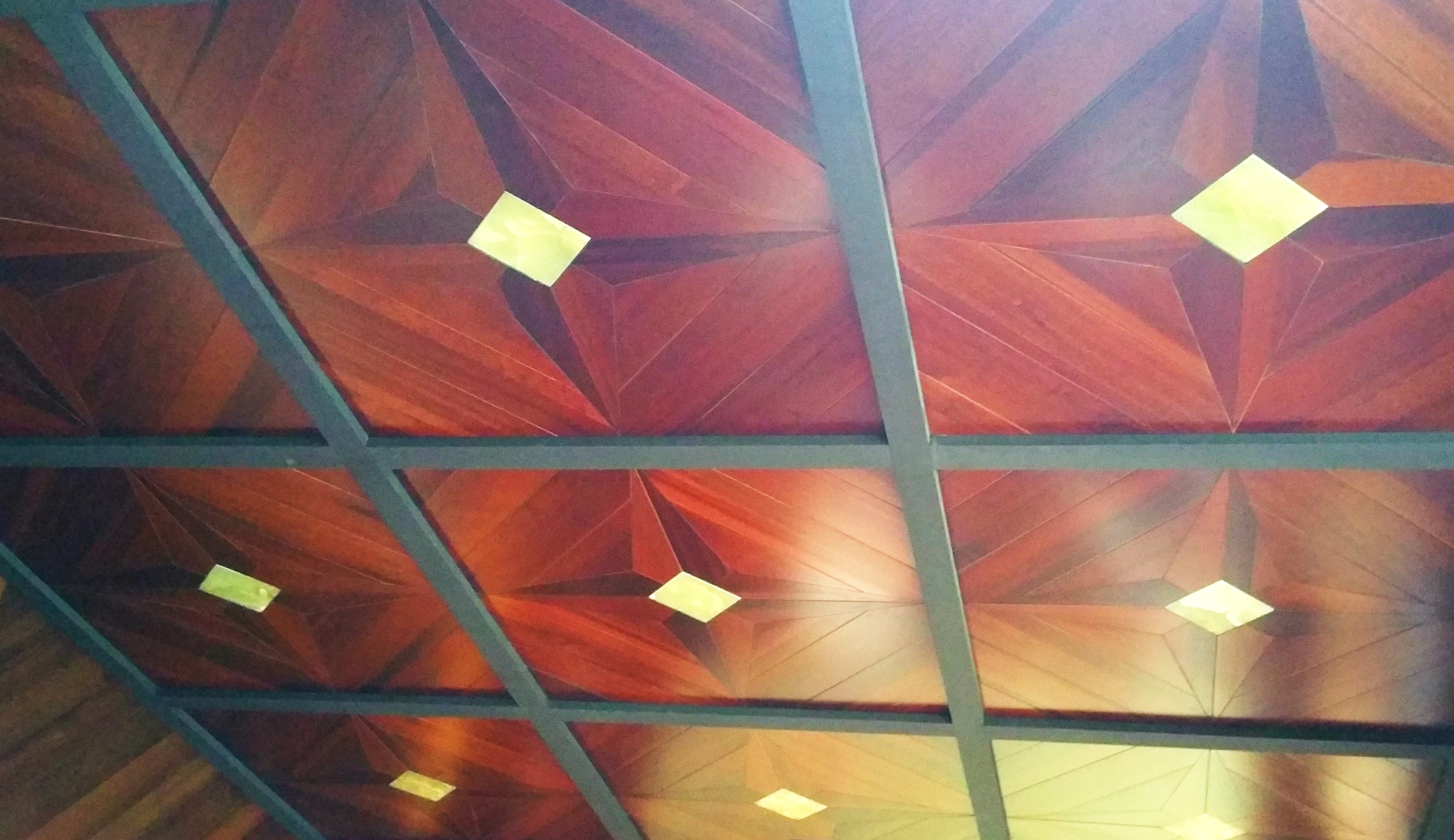 Bespoke walnut ceiling framing detail