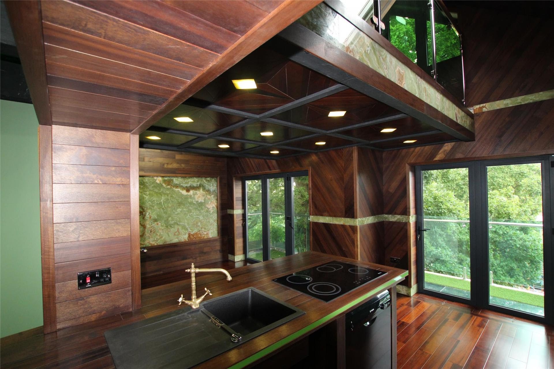 Luxury walnut kitchen with onyx backsplash