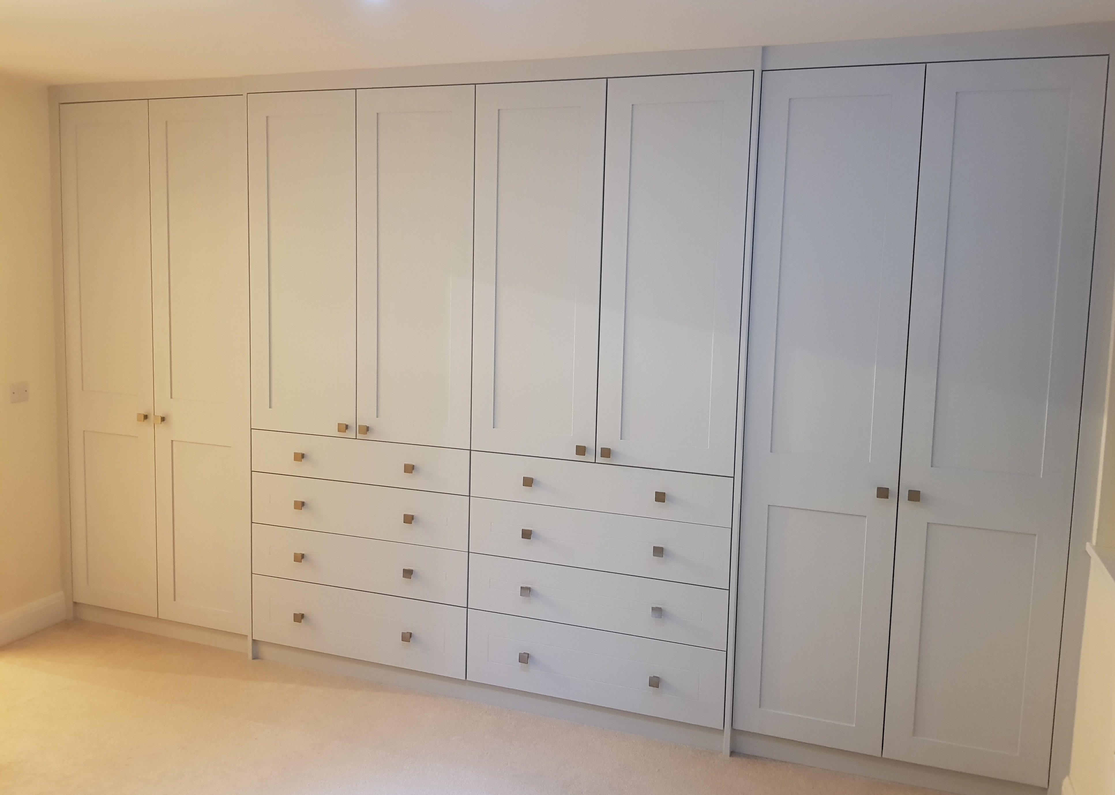 Bespoke fitted furniture with clean lines and integrated storage